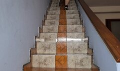 Running down the stairs