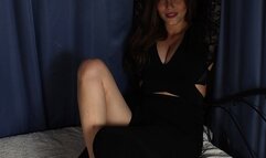 Anne: barefoot girl in black dress, cuffed on the bed with her feet in shackles and with her hands handcuffed above her head and behind the bed post, wiggles and poses to the camera (HD WMV)