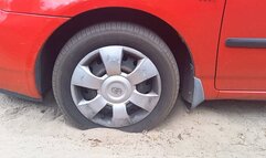 Spinning wheels in sand