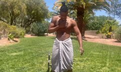 ebony man plays with feet while strokes dick outside