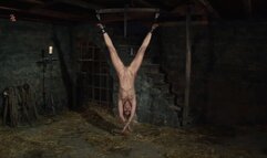 A witch screams out loud orgasms when ropes and chains are pulled over her cunt