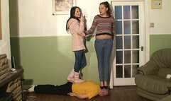 2 Girls Stepping On their Slave
