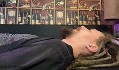 Painfull face and throat trampling in dirty socks on the sofa