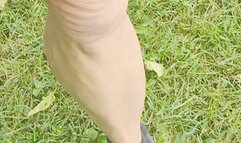 Walking in black sneakers