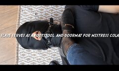 Slave serves as a footstool and doormat for Mistress Cola