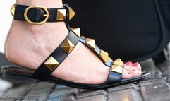 Near her beautiful feet, you can smell the leather of her shoes