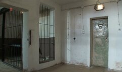 Pretty blonde girl chained to the floor to be bullied