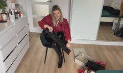 Woman in leather clothes show her boots and heels collection