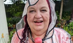 Miss M messing around in the rain in underwear and clear PVC rain coat- TopofthePot,BBW bondage,rainwear,plastic rain mac,ball gagged,woman gagged,women gagged,water,garden hose,ball gag