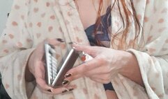 Smoking in see-through lingerie top and wet hair