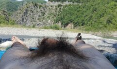 Naked on a public beach - cock tease and worn feet