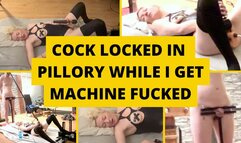Cock locked in pillory while mistress gets machine fucked
