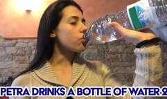 Petra drinks a bottle of water 2 - HD