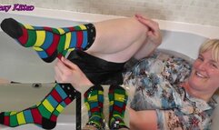 Foxy gets her bright coloured socks wet