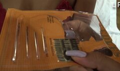 Needles Earlobes And Earrings