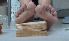 Italian girlfriend -food crush barefoot bread slices under big soles