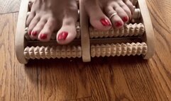 Wood foot massager close up massage, ong toes, wrinkly soles, red nails, milf feet