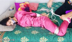 Elsa del Rey is grabbed by a robber while she is bed, then tied and gagged before she can't do anything!