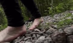 two guys walking on the rocks