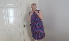 striptease in white boots and stockings and suspenders