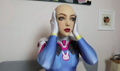 Silicone Doll in Dva Plugsuit Blindfolded, Gagged, with Tubes Inserted as Pussy Vibrated
