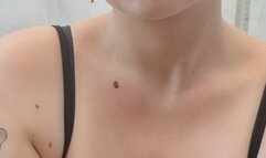 Smoking outside in a black top