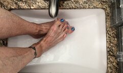 Feet Under Running Water