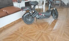 Diana Senior pedal pumping to inflate her electric bike