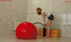 Alla inflates a huge fitness ball with a hand pump and jumps on it!!!
