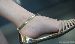 Beauty woman feet in flat sandals o train, candid foot fetish