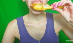 chewing and eating a chicken leg