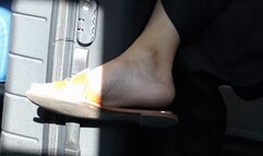 Candid dangling and shoeplay with flat slippers, beauty woman feet moving them