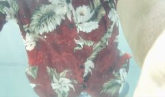 Carissa in Hawaiian shirt, denim shorts, and Keds underwater dancing and stripping for you!