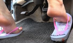Zuzana's feet and flip flops pumping pedals (MOBILE)