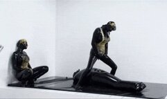 Fucking hot latex sluts in black catsuits and the encased gentleman in inflatable rubber sleeping bag - Part 1 of 3