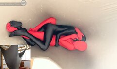 Snuggling in Zentai Suits Inside a Big Hammock
