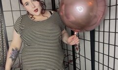 Big round balloon stuffing under dress, belly inflation