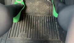 Trixie Love flooring is hard in black nylons and hot green pumps