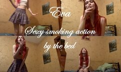 Eva's sexy smoking action by the bed
