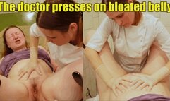 The doctor presses on the patient’s bloated belly, and she screams and strains (4k)