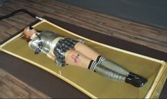 Schoolgirl bondage with duct tape and mini vibro in latex bed