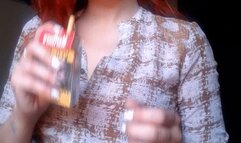 Smilling blowing smoke in your face - Marlboro red