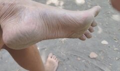 Dirty feet and flaccid dick, naked in public