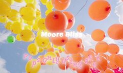 Moore Bliss Pops Already Blown Up Balloons Using Only His Feet