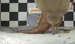 Vinyl Records under merciless stiletto Boots floor view