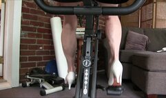 Lilly, pedaling the stationary bike, her granny calves