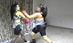 Hard Hitting Female Boxing With Rock-em Sock-em Punches To Head And Body