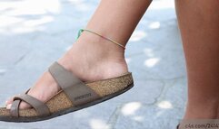 Candid beauty cute feet with birkenstock, moving them