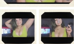 the girl smoking in her green bra