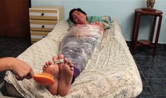 Selena mummified and tickled